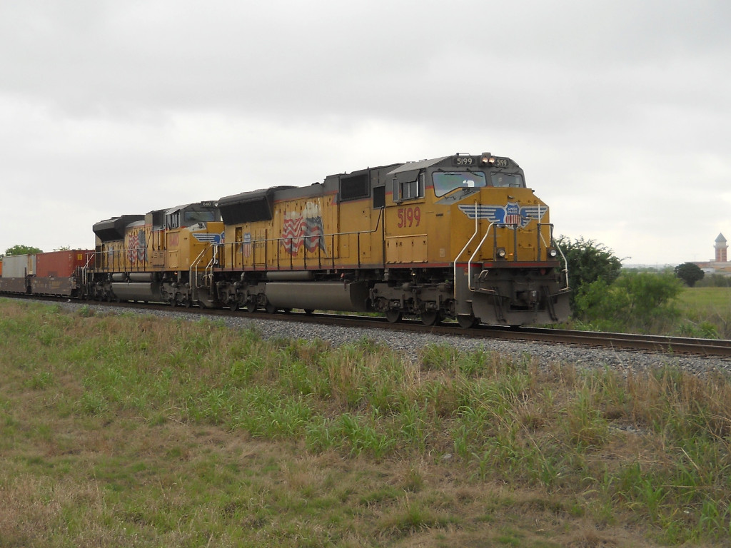 UP 5199  14Apr2011  NB across Center Point Road riding the rear of Train 7444 with stacks 